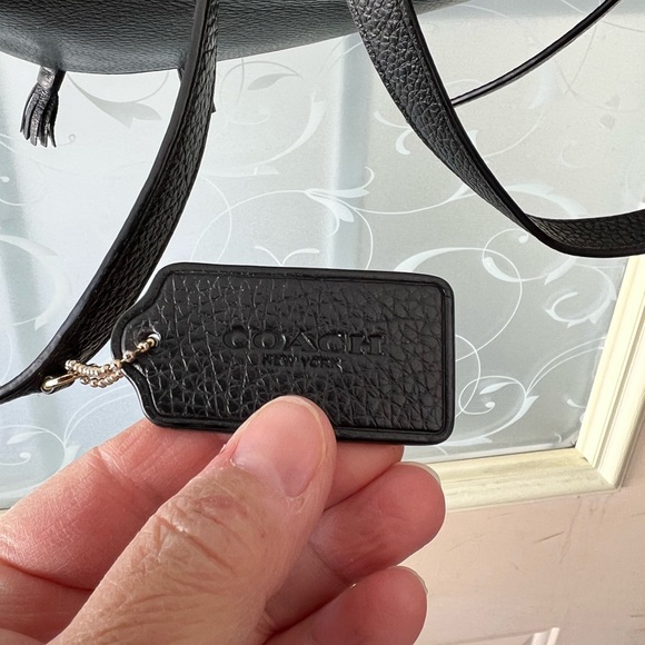 Coach Elle Backpack in black pebbles
Leather. Like new. Gold tone hardware. main image 12
